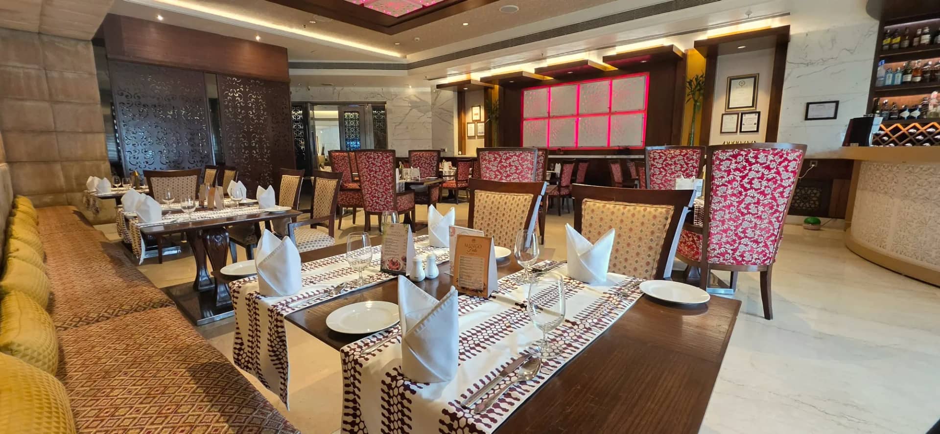 Tables laid for dinner at Raajsik