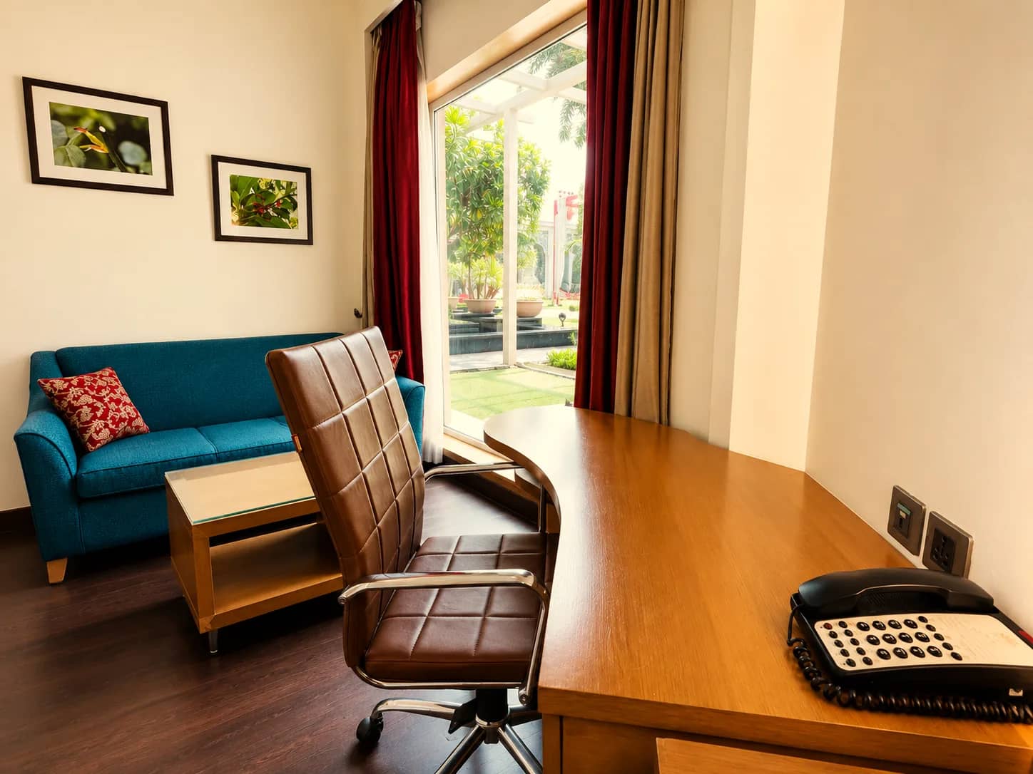 Writing desk and sofa by the window