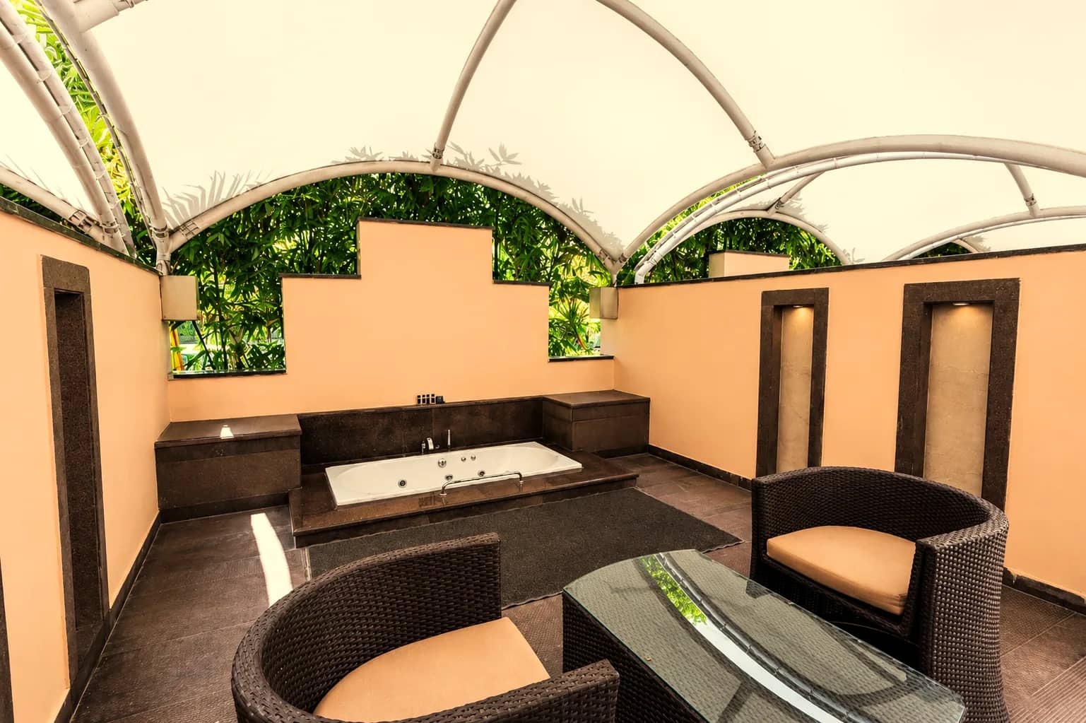 Private terrace with a canopied Jacuzzi