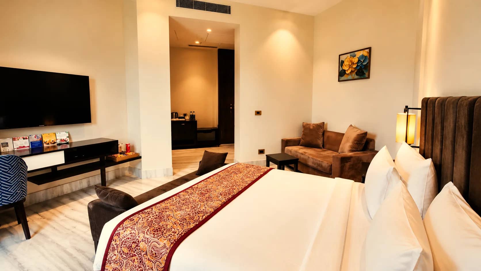 Junior Suite from the bed to the lounge