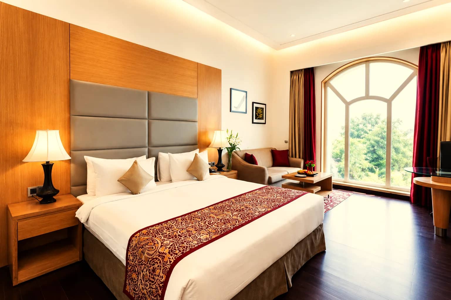 Superior Room with a king bed and an arched garden window
