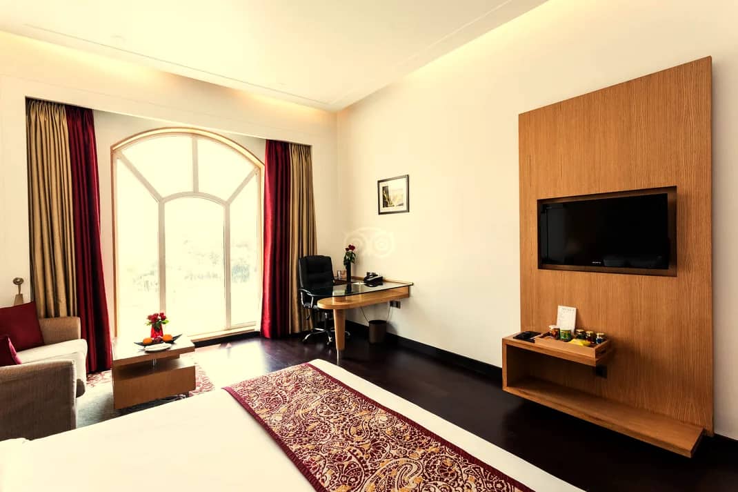 Superior Room with its arched window and writing desk